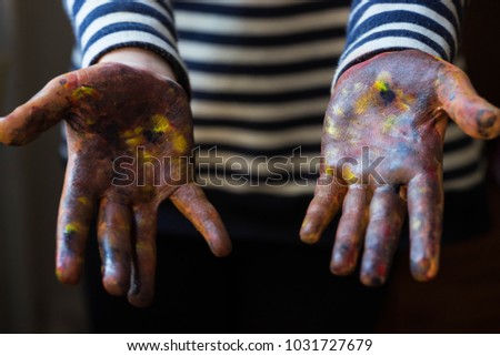 Kids hands in paint