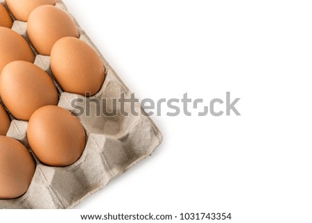 An brown eggs in the tray on white background, isolate, close up picture