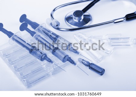 A medical syringe in a composition in a medical room