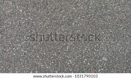 The surface of the concrete road through the use.