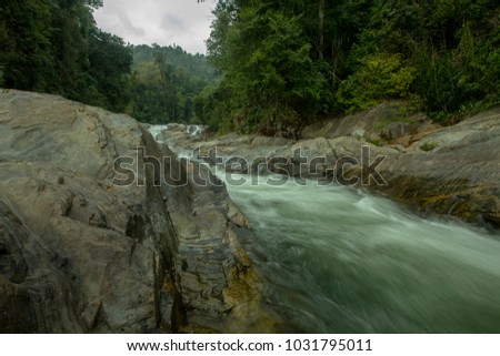 scenic atmosphere in the waterfall area of Lata Renyuk, Jeli, Kelantan, Malaysia