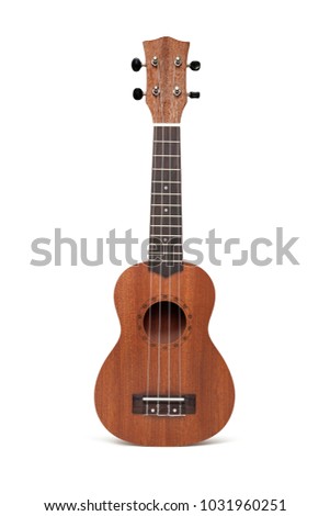 The brown ukulele guitar isolated on the white background Royalty-Free Stock Photo #1031960251