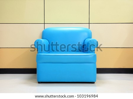 Cyan sofa and modern wall