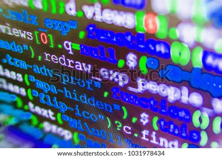 IT business company. HTML markup language closeup. Software source code. JavaScript code in text editor. Coding cyberspace concept. PHP data source file. Programming code. Vivid colors. 