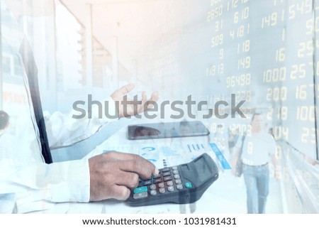 Double exposure Partner Business team Making great business discussion in conference room at coworking office with stock blurred background, Analyze Business Startup Investment plans  