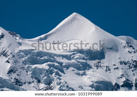 Spectacular view of the mountain Jungfrau and the four thousand meter peaks in the Bernese Alps from Greendeltwald valley, Switzerland Royalty-Free Stock Photo #1031999089