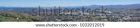 Expansive panorama of the business and residential areas of south San Jose; downtown San Jose in the background; Santa Clara county, San Francisco bay area, California