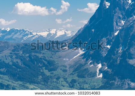 Spectacular view of the mountain Jungfrau and the four thousand meter peaks in the Bernese Alps from Greendeltwald valley, Switzerland Royalty-Free Stock Photo #1032014083