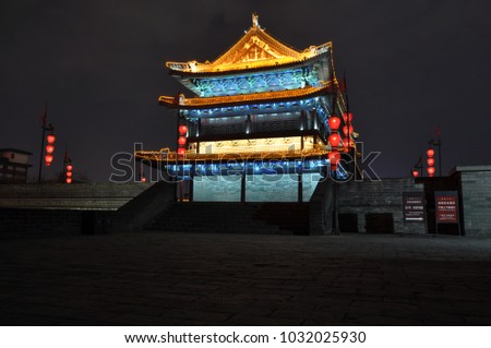 The city wall of xi 'an at night is a famous scenic spot of ancient architecture.