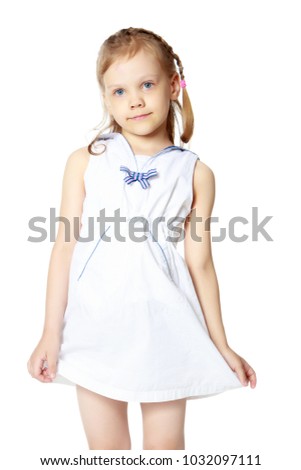 Little girl, the gesture is quiet. The concept of secrecy, games, observance of silence. Isolated over white background