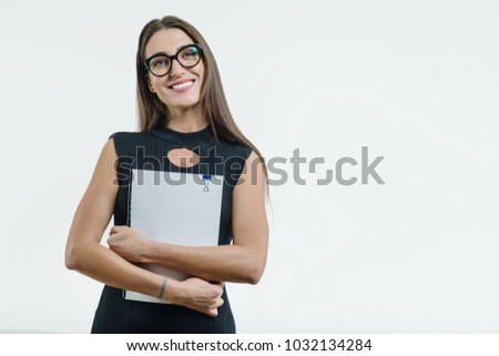 Positive smiling businesswoman showing a clean white document with copy space. White background