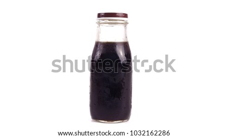 Black coffee in bottle isolated on white background