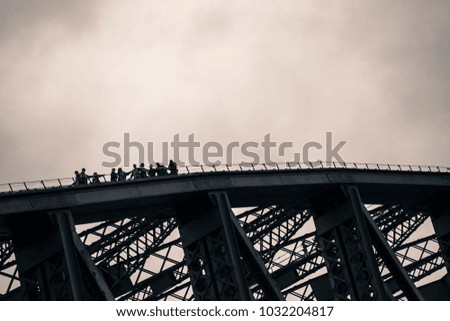 Bridge climb as foreground with grey skies in background
