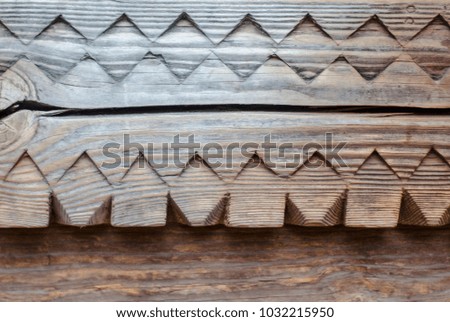 Carved wooden antique texture ethnic background. Ukrainian architecture
