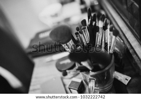 Brushes makeup artist. Workplace makeup artist. Black and white photo. Wedding preparations. Morning of the bride. Wedding make-up.