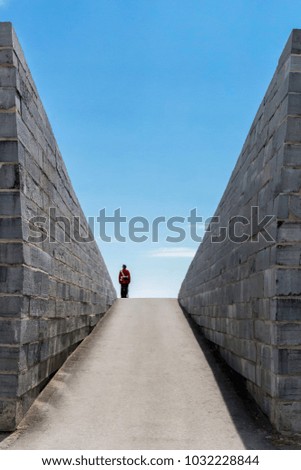 a guard standing at the top of a ramp