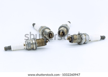 Old spark plug isolated on the white background