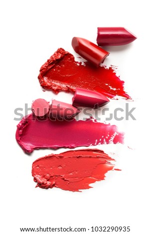 Creative concept photo of cosmetics swatches beauty products lipstick on white background
