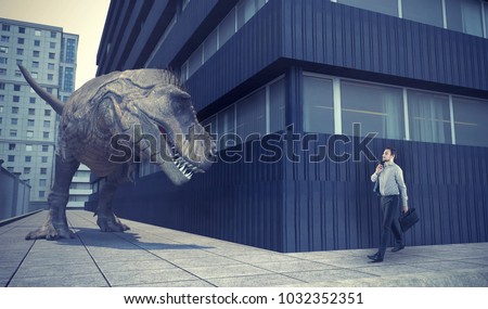 Businessman walking in town and a dinosaur is waiting for him round the corner.
