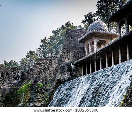 Rock garden, tourist attraction in Chandigarh, Punjab, India. Royalty-Free Stock Photo #1032353500
