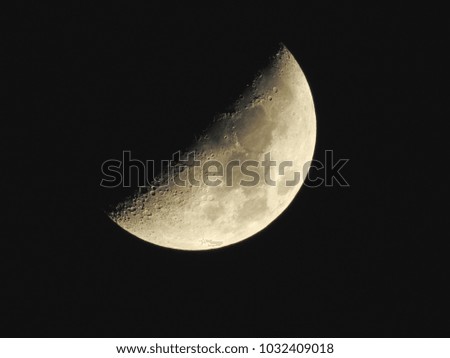 Waxing Moon in a Night Sky