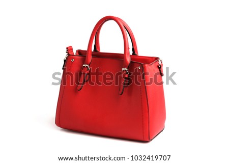Red elegant female bag with two handles on white background isolated Royalty-Free Stock Photo #1032419707