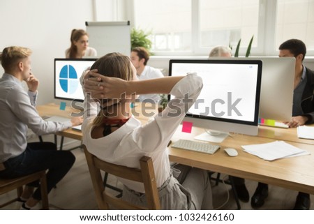 Rear view at businesswoman holding hands behind head resting after finishing work on computer in multiracial office, company manager employee relaxing or thinking taking short break at workplace Royalty-Free Stock Photo #1032426160