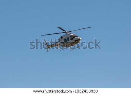 flying helicopter in the sky