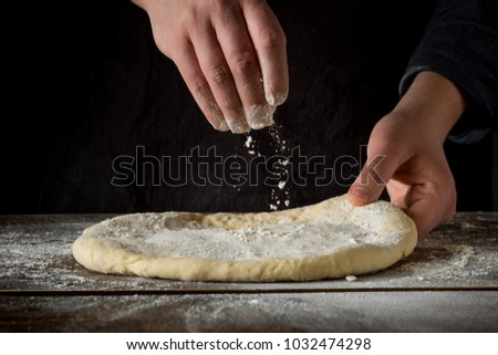 Pastry dought cooking process for italian pizza preparation, copy text.