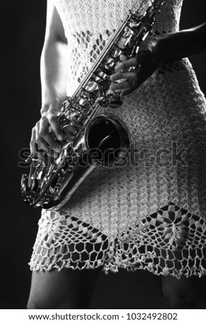 woman with a saxophone