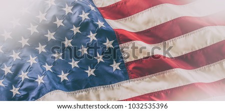 Close-up american flag,studio shot. Royalty-Free Stock Photo #1032535396