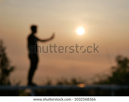Blurring man and the sun.This pic is blur picture