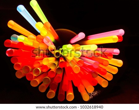 The color of the drinking straw reflects the sun