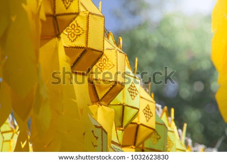 Hanging Northern Thai style lanterns and blue sky.They can see in Northern of Thailand. They are decorated in important festivals such as Loy Krathong Festival, songkran festival etc.