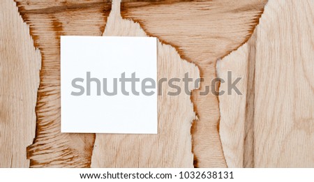 White stickers on wooden background