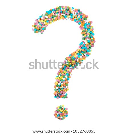 English alphabet letters, numerals and symbols made of little candies isolated on white background