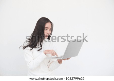 woman working at office and using Notebook.