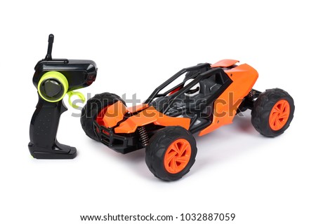 RC model rally, off road buggy with remote control. Isolated on white background, joy and fun sport. Royalty-Free Stock Photo #1032887059