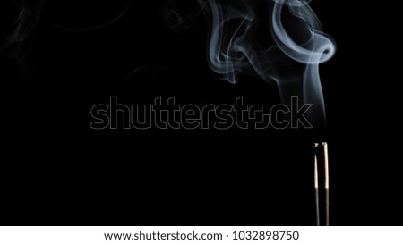 Abstract Smoke Photography White Color using incense stick highlighted in flash light 22