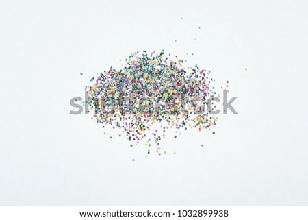 multicolored small balls on white background