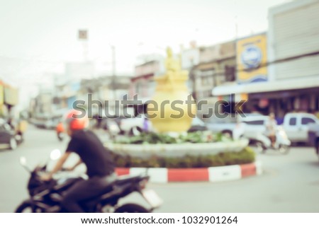 Vintage tone blurred defocused people on thailand street market 