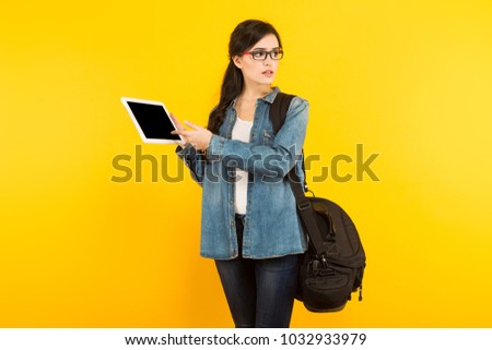 Young woman with bag and pc
