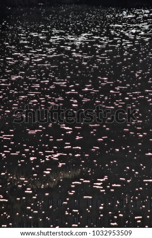 abstract photograph of pollution in the water on the Tagus River, in Toledo, Spain,