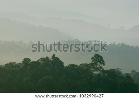 Beautiful scenary of mist with mountain range at PanoenThung view point in Kaeng Krachan national park,Thailand
