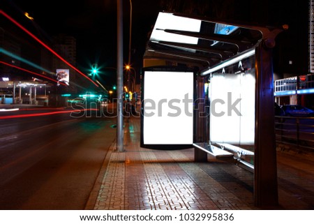 mock up of a light advertising box at a bus stop at night.