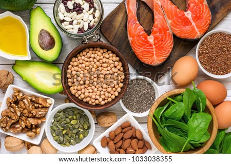 Food rich in omega 3 fatty acid and healthy fats. Healthy diet eating concept. top view Royalty-Free Stock Photo #1033038355