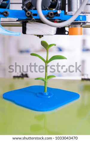 Young Plant Growing.3d printer of the device during the processe