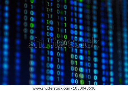 Digital binary data on computer screen. Close-up with small dept