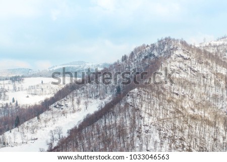 winter mountain top under sunny blue sky