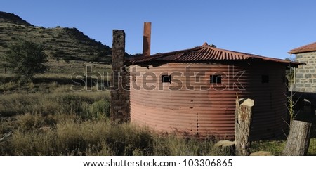 Anglo- Boer War pillbox, Karoo. These pillboxes were built i n line of sight to each other along railways in south africa to protect the railway from attack by Boer commandos. Note the bullet holes Royalty-Free Stock Photo #103306865